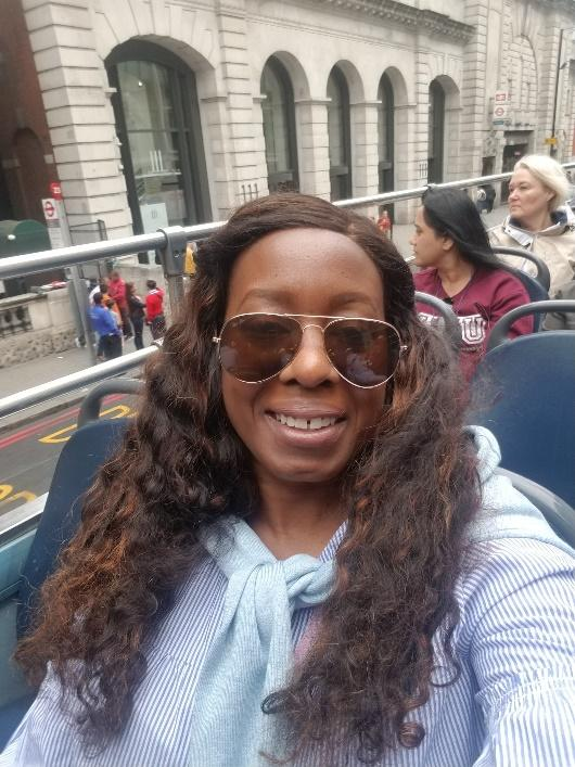 An African American woman on a bus