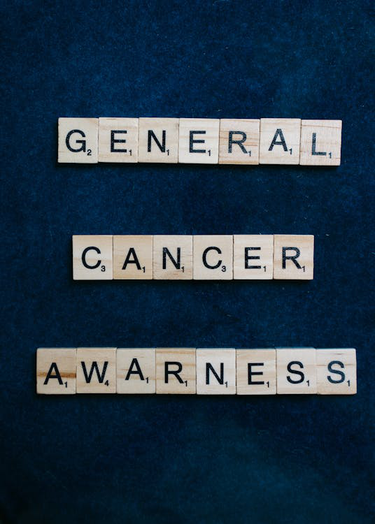 Scrabble tiles spelling "General Cancer Awareness."