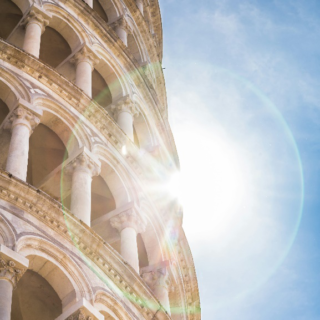 Sunburst behind the Leaning Tower of Pisa.