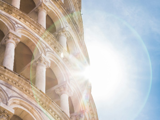 Sunburst behind the Leaning Tower of Pisa.