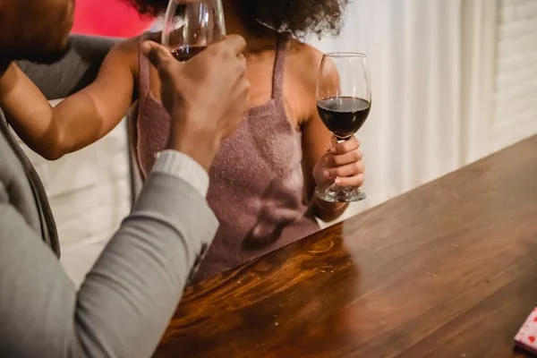 A couple enjoying a romantic wine-tasting experience on Valentine’s Day.